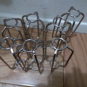 Tozai hinged flower 7 small vases. Stainless steel